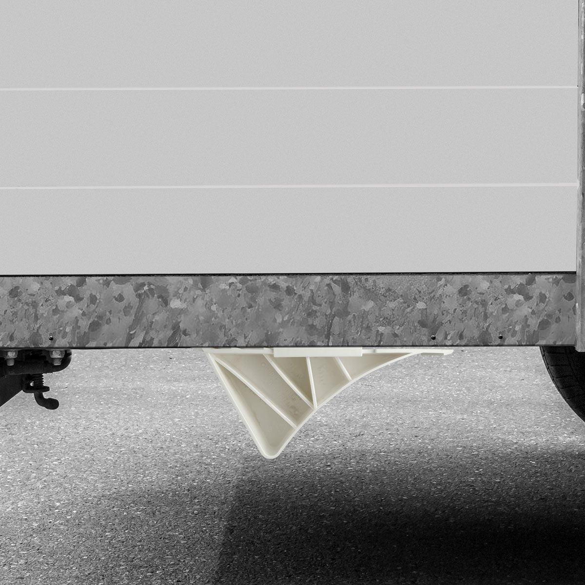 Cale roue avec fixation de rangement